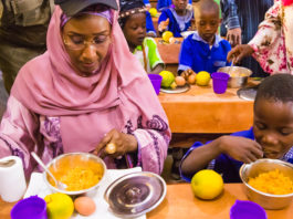 The Honourable Minister of Humanitarian Affairs, Disaster Management and Social Development, Sadiya Umar Farouq during a Home Grown School Feeding Programme.